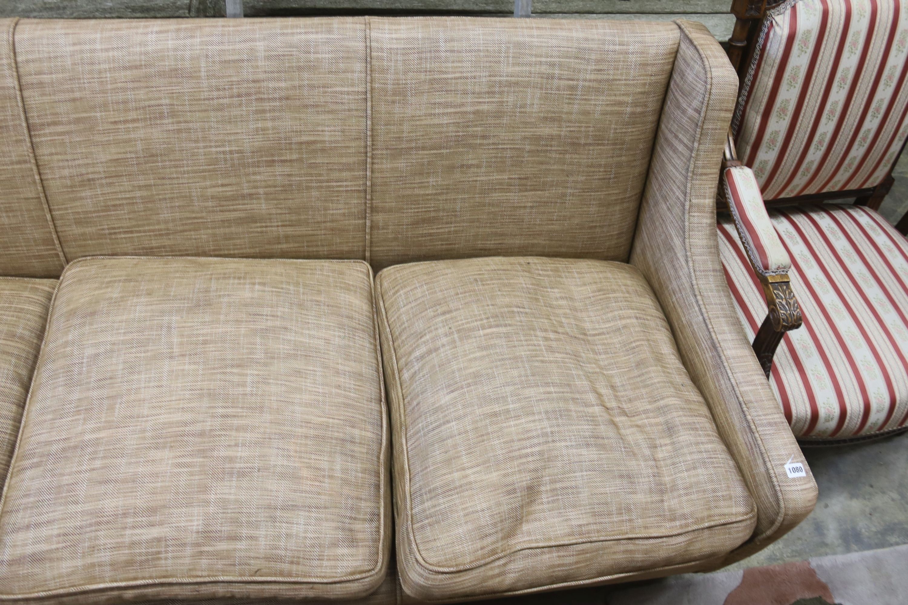 A contemporary upholstered three seater settee, width 190cm, depth 84cm, height 80cm